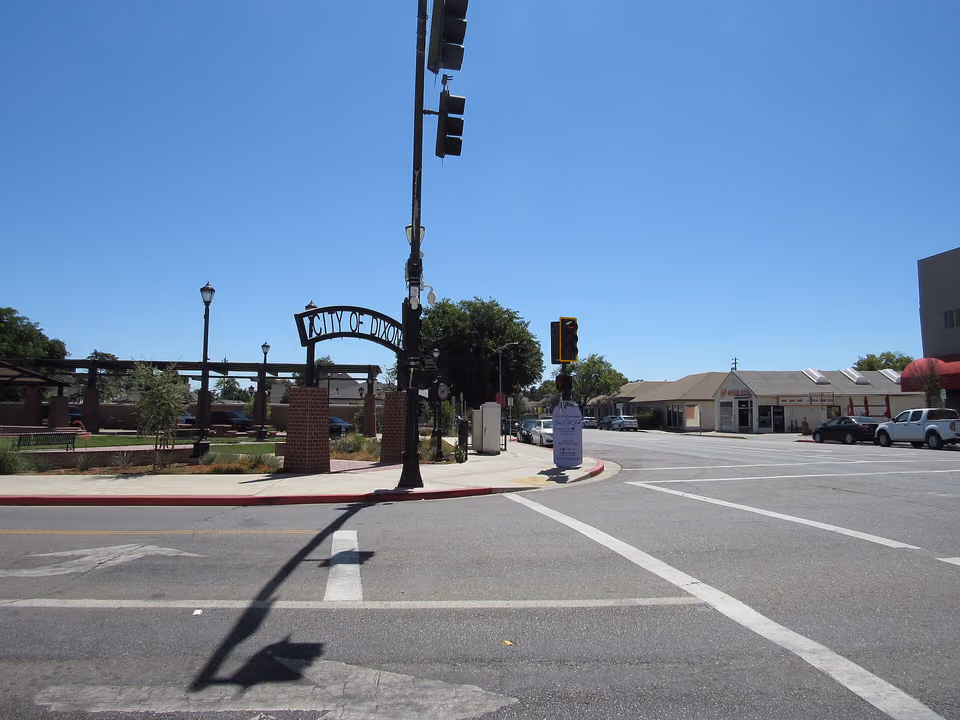 Intersection of First and A Street in downtown Dixon with the City of Dixon arch